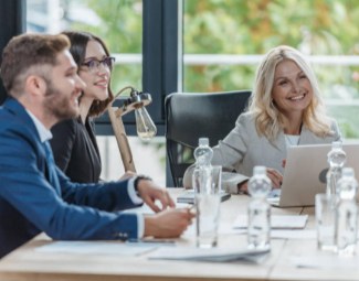 Happy employees having a meeting